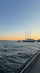 CN Tower and Lake Ontario at golden hour, Toronto