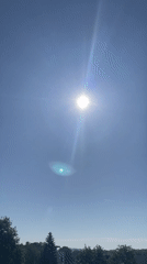 Clear sunny morning documented across urban residential area