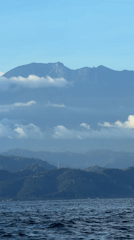Ocean view of Nusa Penida coastal mountains recorded
