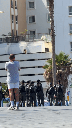 Morning scenes capture daily Tel Aviv life, workouts, Pride celebrations