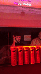 DJ party scene documented in Milan with snacks and beverages