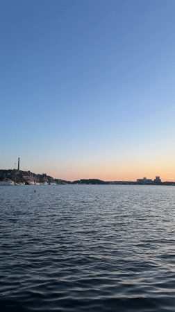 Stockholm waterfront captured at twilight in peaceful evening scene