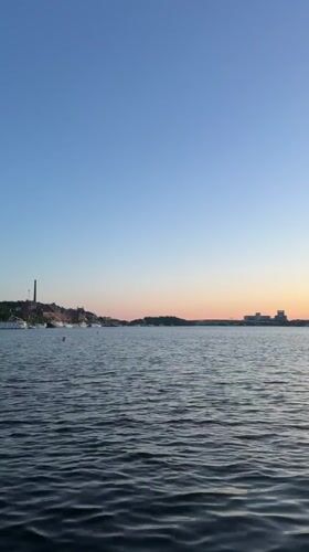Stockholm waterfront captured at twilight in peaceful evening scene