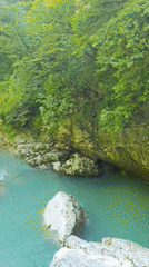 Turquoise river flows through Georgia's lush Martvili Canyon