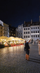Warsaw Old Town buzzing on a warm summer night