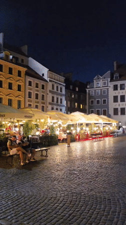 Warsaw Old Town buzzing on a warm summer night