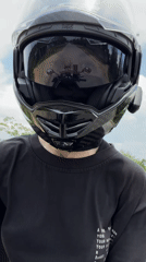 Motorcyclist observed standing with bike in Huế, Vietnam