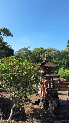 Temple visit and dog walking captured in Kediri, Indonesia