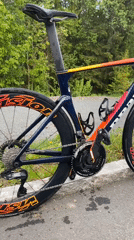Road bike photographed on curb in Lommedalen, Norway
