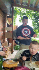 Family barbecue gathering documented in Chaikovsky backyard