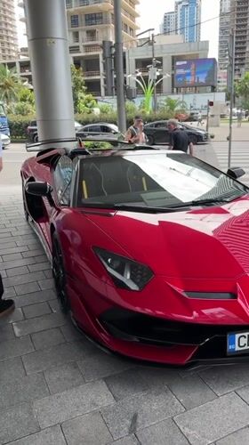 Lamborghinis on Batumi's promenade amid construction and crowds