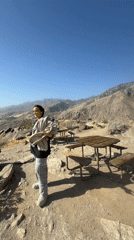 Visitor enjoys mountain overlook views in Palm Springs