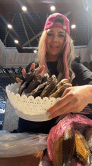 Odesa market vendor shows off fish and dried goods