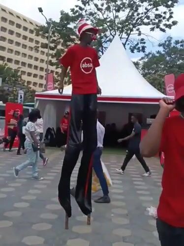 Stilt performer entertains crowds at promotional event in Nairobi