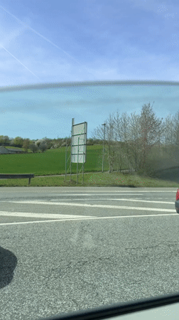 Green convertible spotted on road near Mayen, Germany