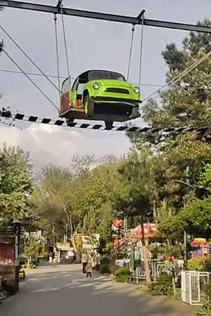 Suspended car installation spotted above park walkway in Anapa