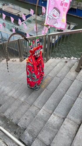 Tourist documents Chongqing's Yuzhong District riverfront and urban landscape