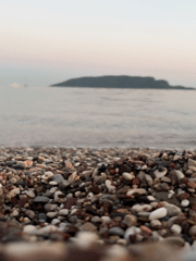 Dusk to moonlight on Budva's pebble beach