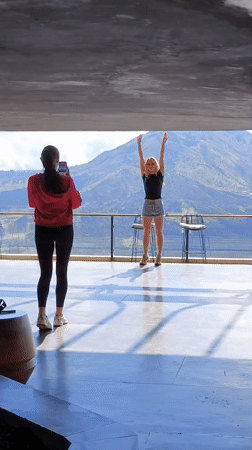Young women visit scenic mountaintop cafe in Kintamani, Indonesia