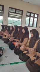 Students perform synchronized dance routine in Indonesian classroom