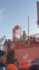 Tel Aviv residents enjoy leisurely outdoor activities and beach concert