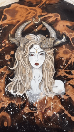 Horned woman artwork documented on fabric in Bobrovo