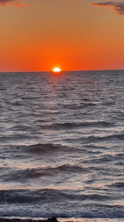 Baltic sunset, Gremersdorf beach, orange sky and calm sea