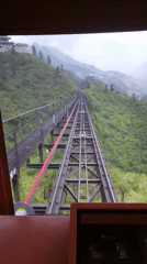 Funicular railway journey through mountainous terrain documented by witness