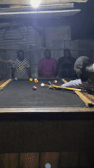 Evening pool games in a rustic Jos billiards spot