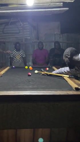 Evening pool games in a rustic Jos billiards spot