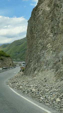 Travelers document Georgian mountain road and historic stone church