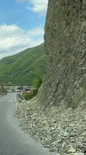 Travelers document Georgian mountain road and historic stone church