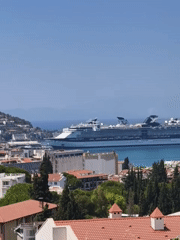 Cruise ship docked at Kuşadası harbor on the Turkish Aegean coast.