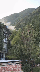 Building with metal staircase documented in Dharamkot, India