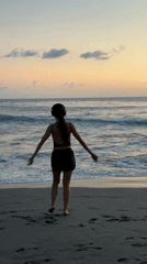 Women enjoy sunset beach activities in North Kuta, Indonesia