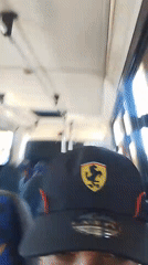 Ferrari cap wearer filmed inside blue-seated van in Porlamar