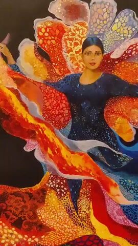 A painting of a woman dancing with a colorful dress. The woman is wearing a dark blue dress with a patterned design. Her dress is flowing around her like a skirt, and it is made of various vibrant colors. The background is black. The woman has dark hair pulled back into a bun, and she is looking towards the viewer with a neutral expression. The painting appears to be in a realistic style, with a focus on capturing the movement and texture of the fabric.