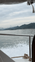 Mother and child enjoy early morning boat ride in Vietnam