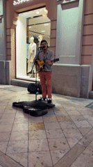 Musicians and vendors fill Freedom Square in Tbilisi at dusk
