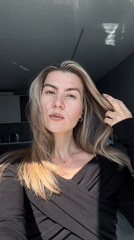 Blonde woman documented across multiple indoor settings over morning hours