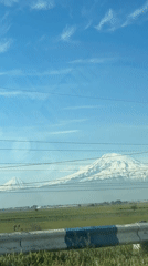 Traveler captures mountain views from roadside near Vagharshapat, Armenia