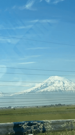Traveler captures mountain views from roadside near Vagharshapat, Armenia