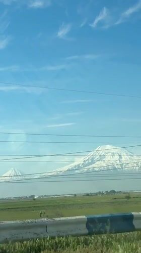 Traveler captures mountain views from roadside near Vagharshapat, Armenia