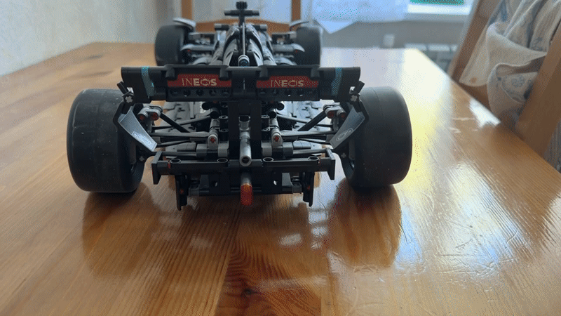 LEGO Formula 1 models displayed on table in Pavlovo