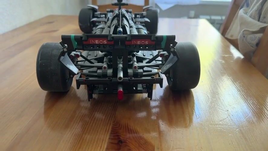 LEGO Formula 1 models displayed on table in Pavlovo
