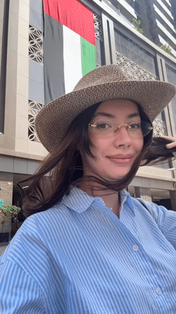 Woman films herself while walking on Dubai walkway
