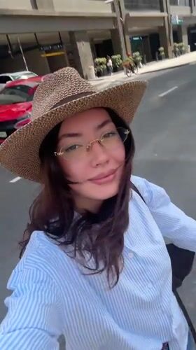 Woman films herself while walking on Dubai walkway