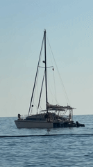 Peaceful sailing and beach activity observed in Fethiye, Turkey