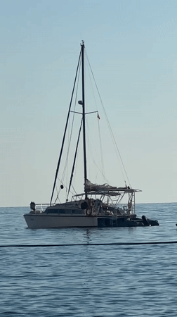 Peaceful sailing and beach activity observed in Fethiye, Turkey
