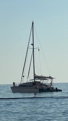 Peaceful sailing and beach activity observed in Fethiye, Turkey